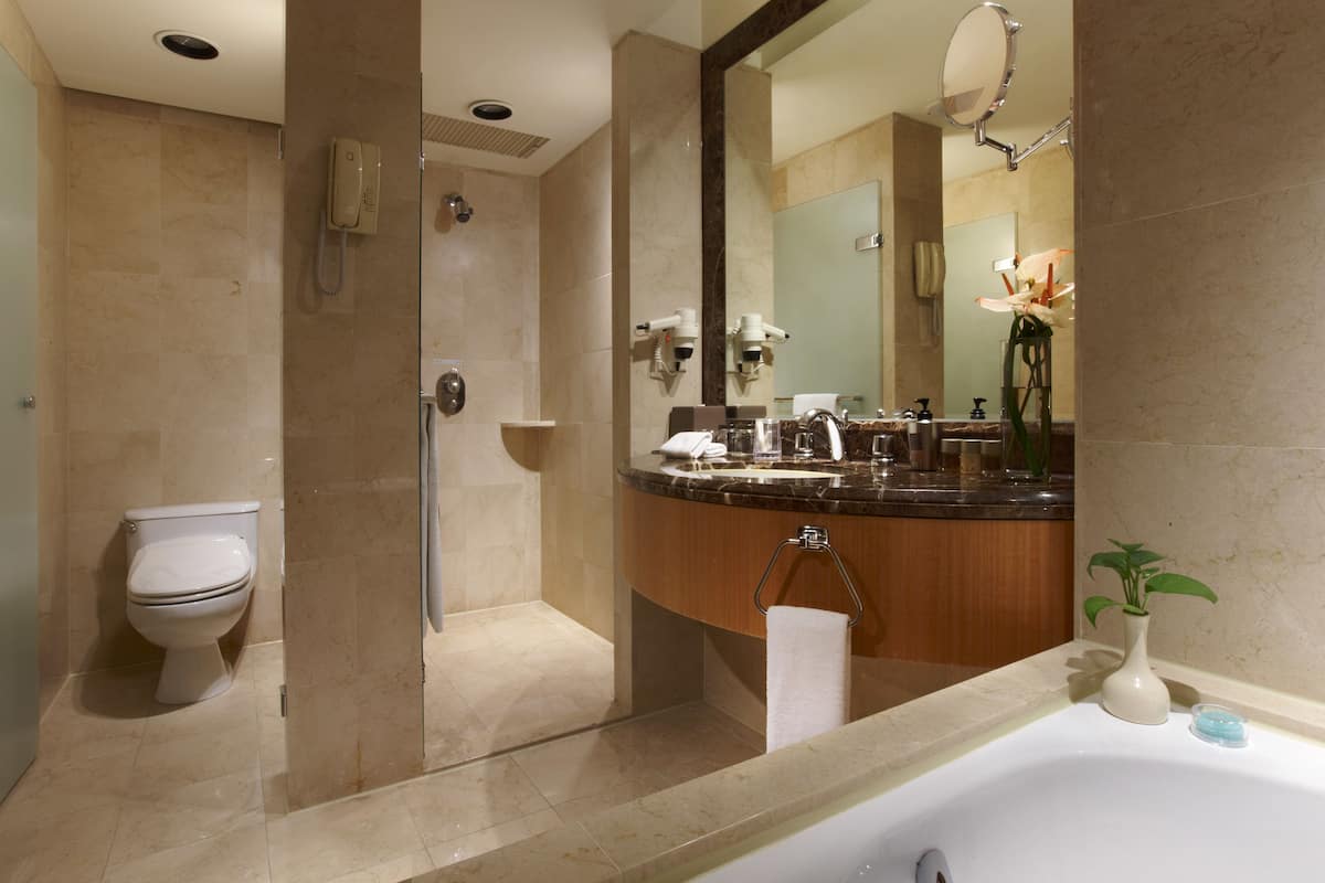 separate bathtub and shower, deep-soaking bathtub, free toiletries