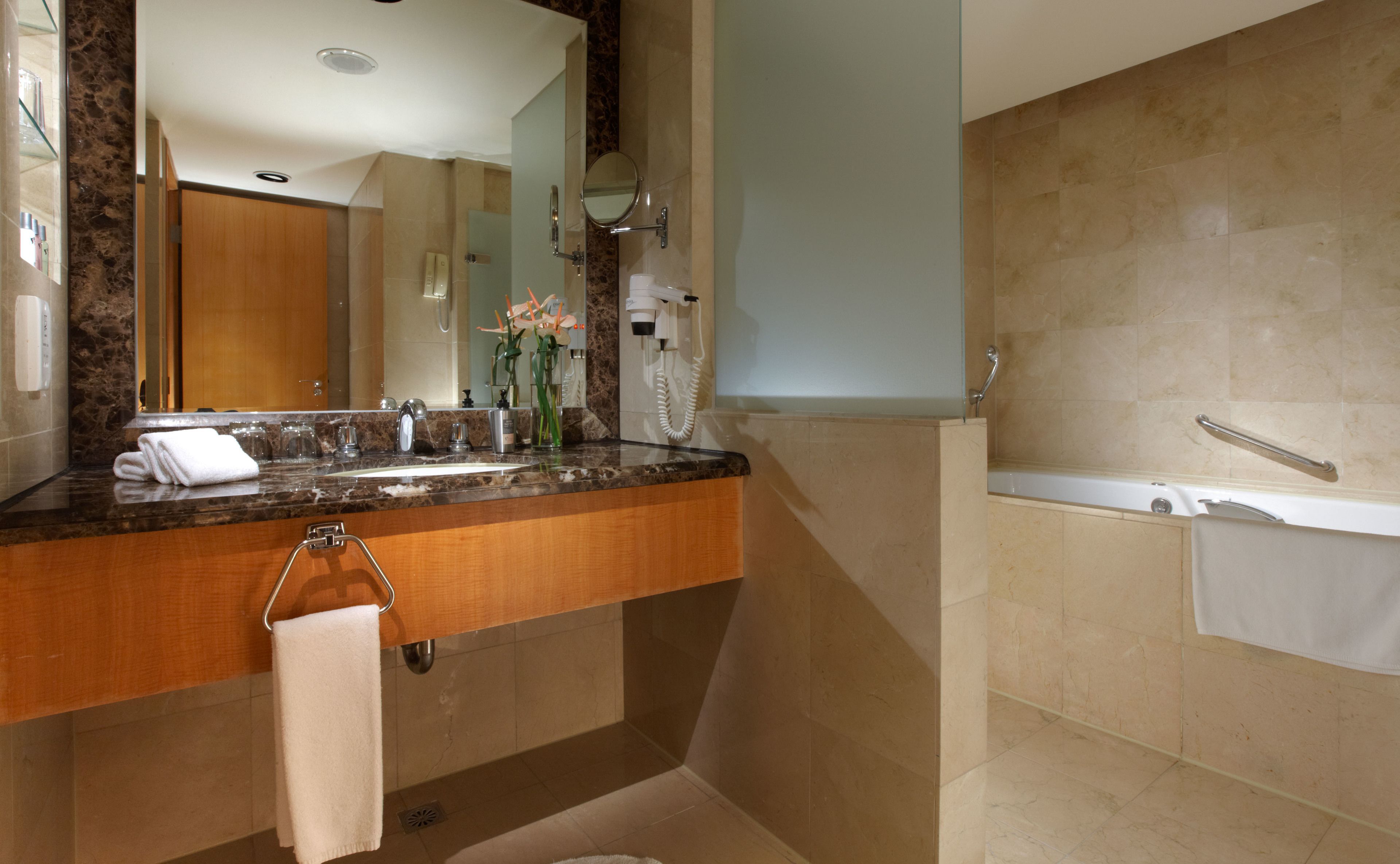 splendor suite | bathroom | separate bathtub and shower, deep-soaking bathtub, free toiletries