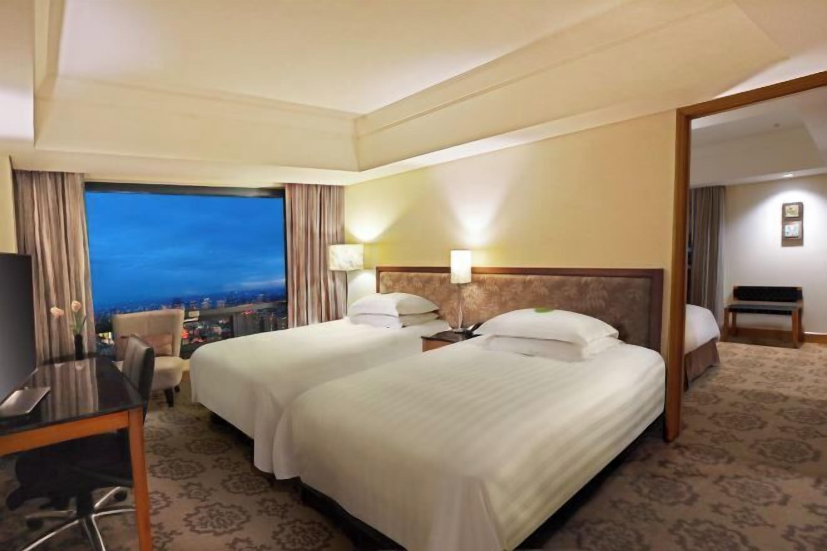 Premium bedding, down duvets, in-room safe, desk