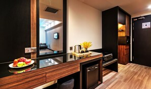 Down duvets, Select Comfort beds, in-room safe, desk