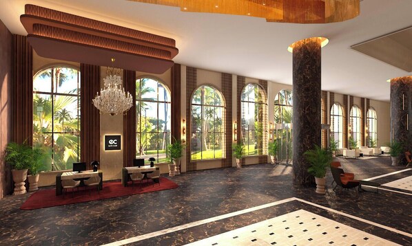 A spacious lobby with a reception desk, large windows, and a chandelier. -  Riu Palace Mexico - Adults Only - All Inclusive (Playa del Carmen)