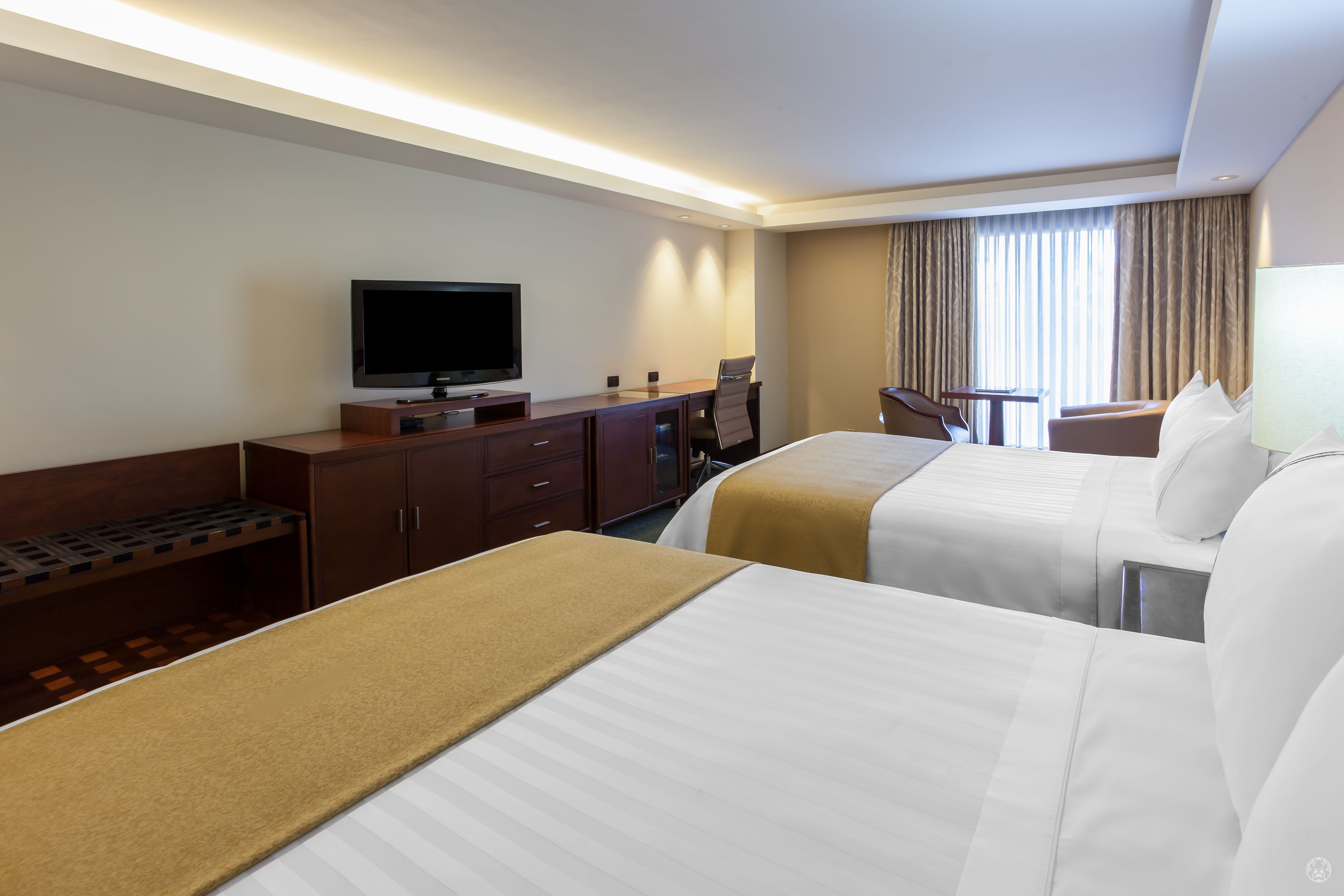 premium bedding, down duvets, memory-foam beds, minibar