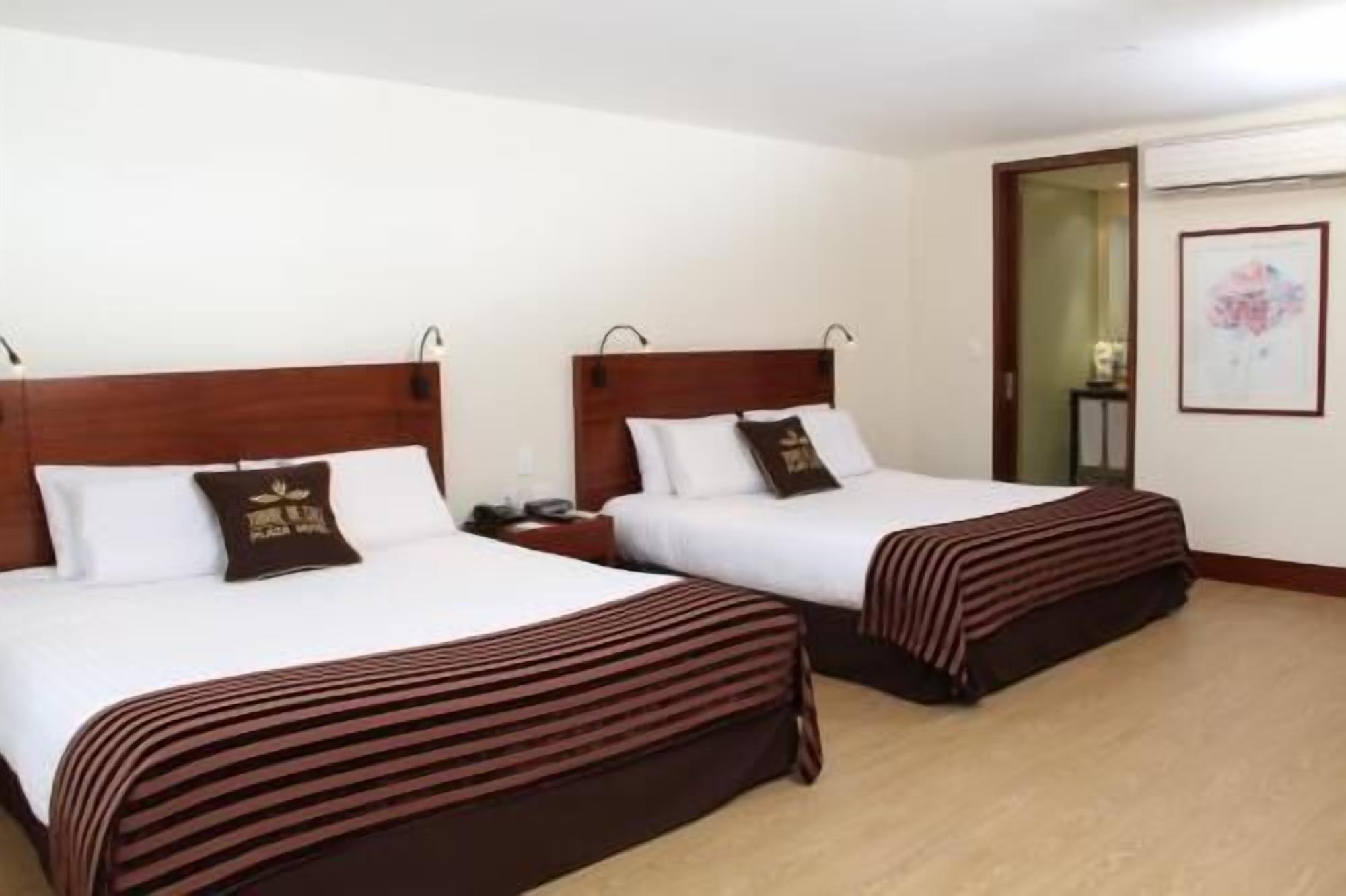 Hypo-allergenic bedding, pillow-top beds, in-room safe, desk