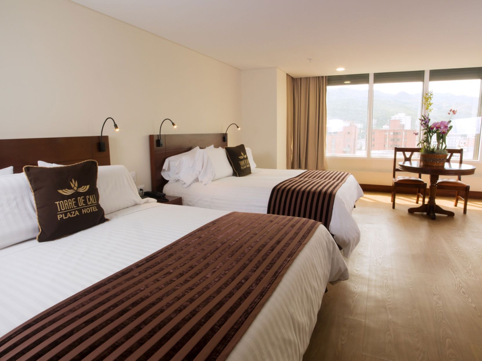 Hypo-allergenic bedding, pillow-top beds, in-room safe, desk