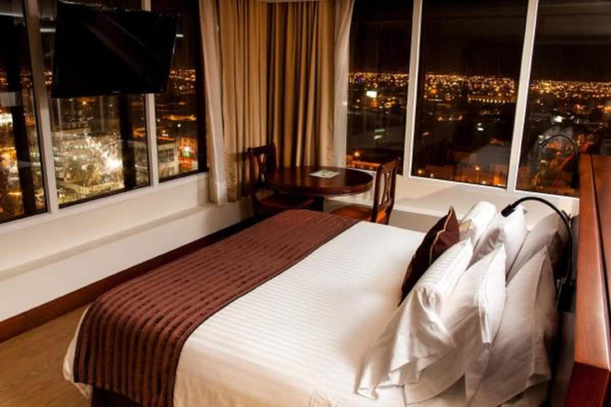Hypo-allergenic bedding, pillow-top beds, in-room safe, desk