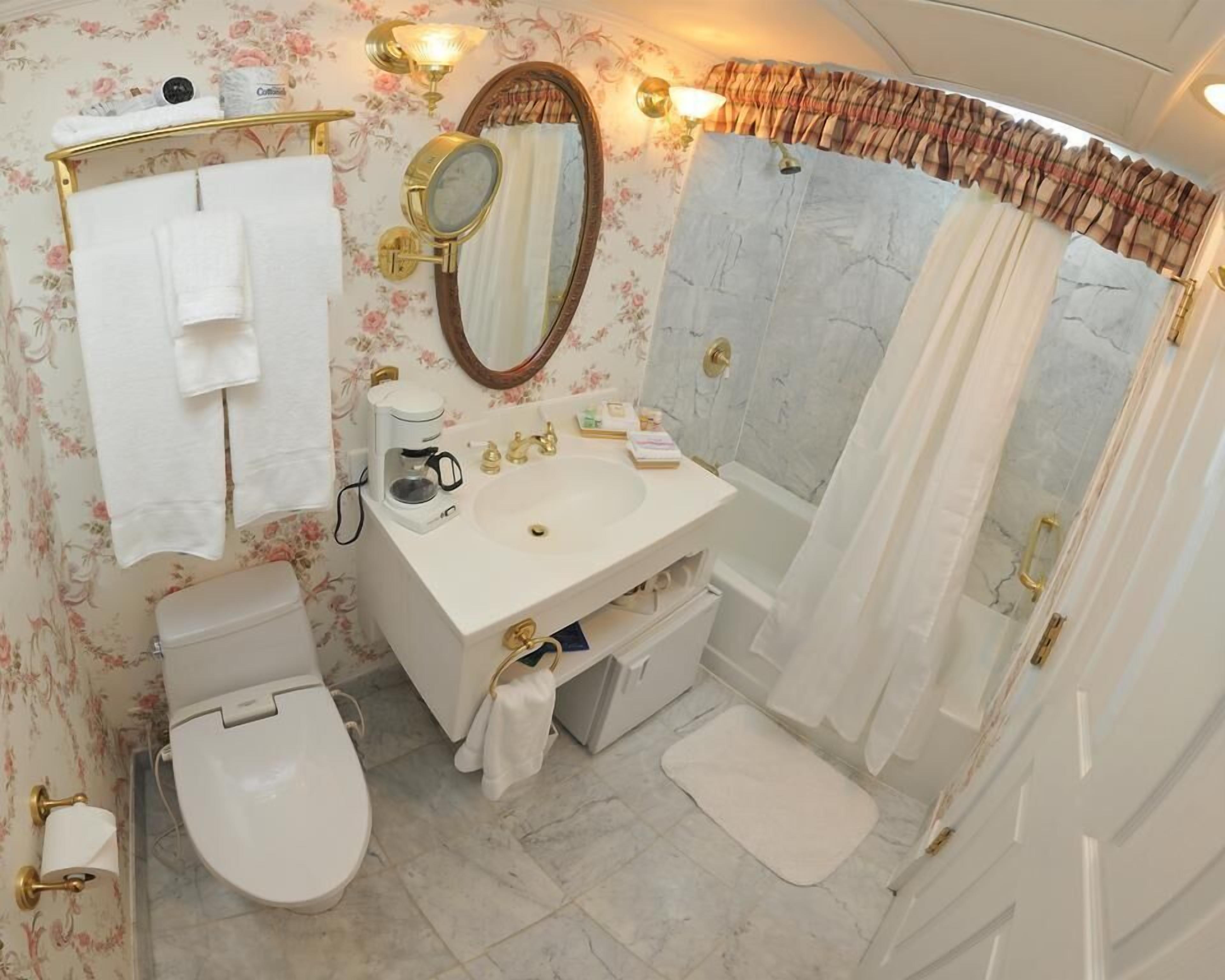 Bathroom | Designer toiletries, hair dryer, bathrobes, towels