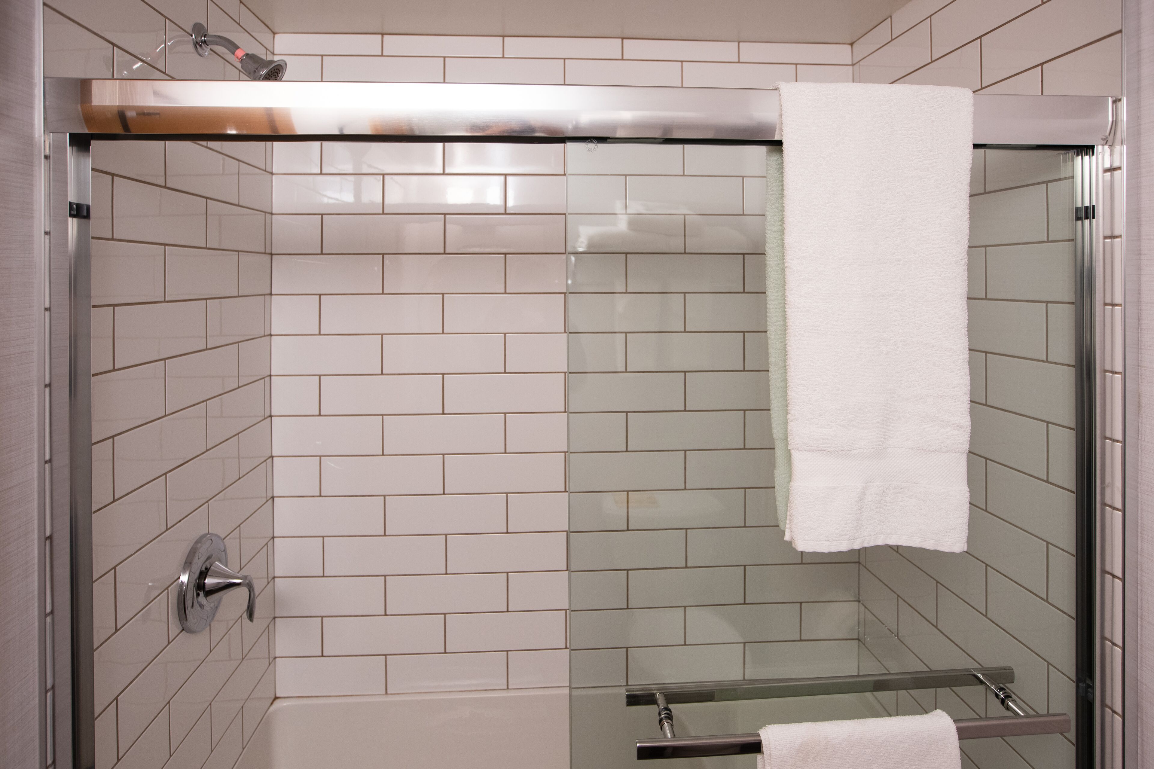 whistler room - one queen, one sofabed | bathroom | shower, eco-friendly toiletries, hair dryer, towels