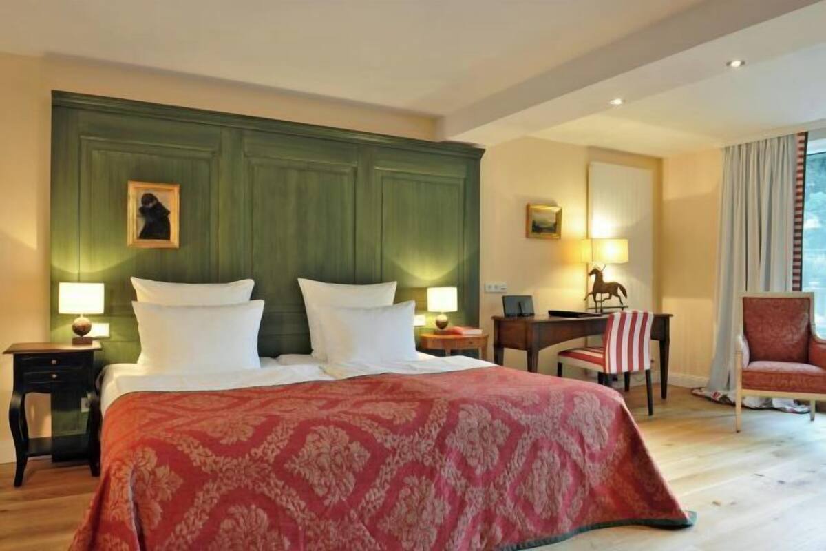 Luxe beddengoed, een minibar, een kluis op de kamer, een bureau