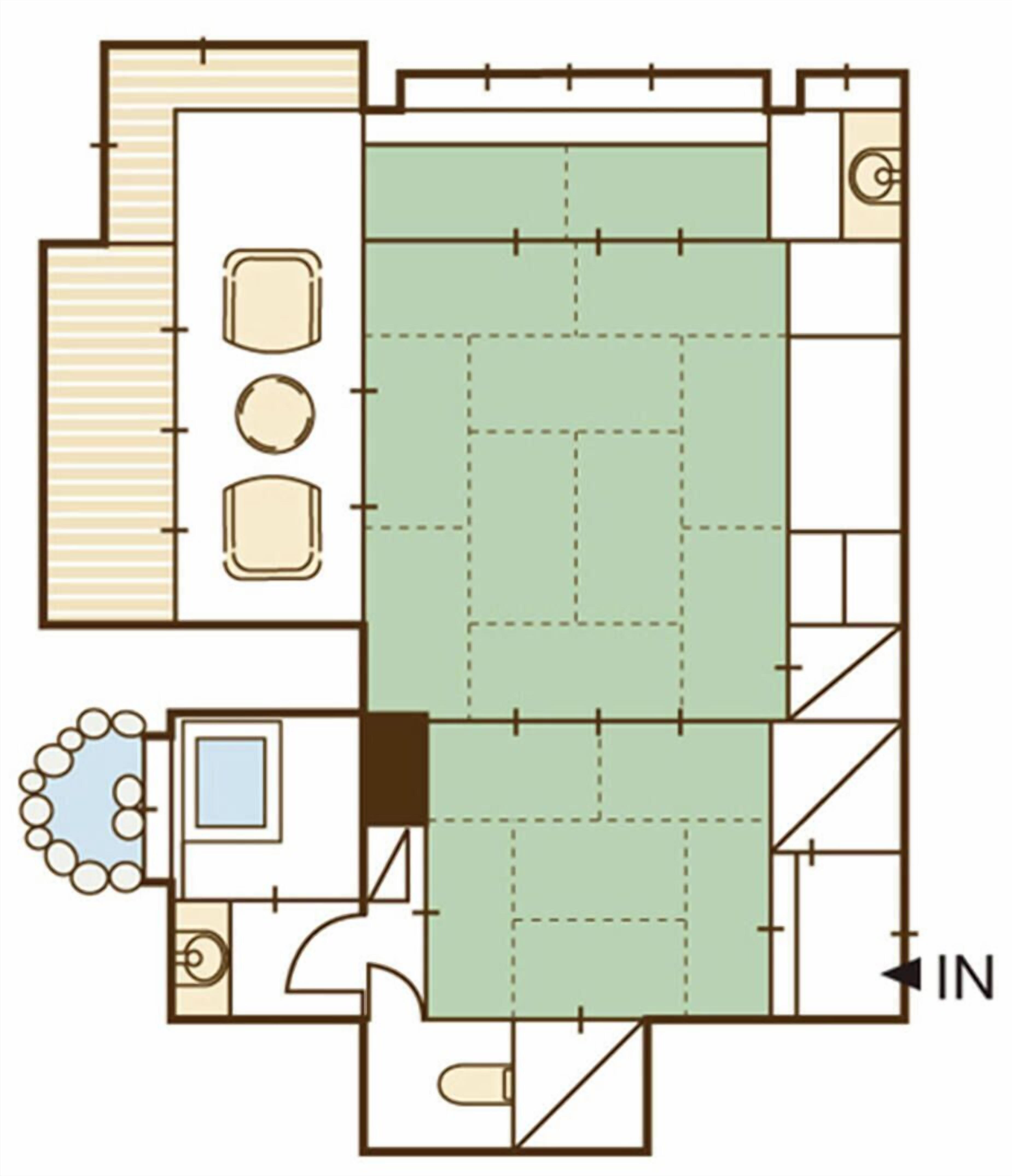 A floor plan with a large central living area, a kitchen, a dining area, and a bathroom.