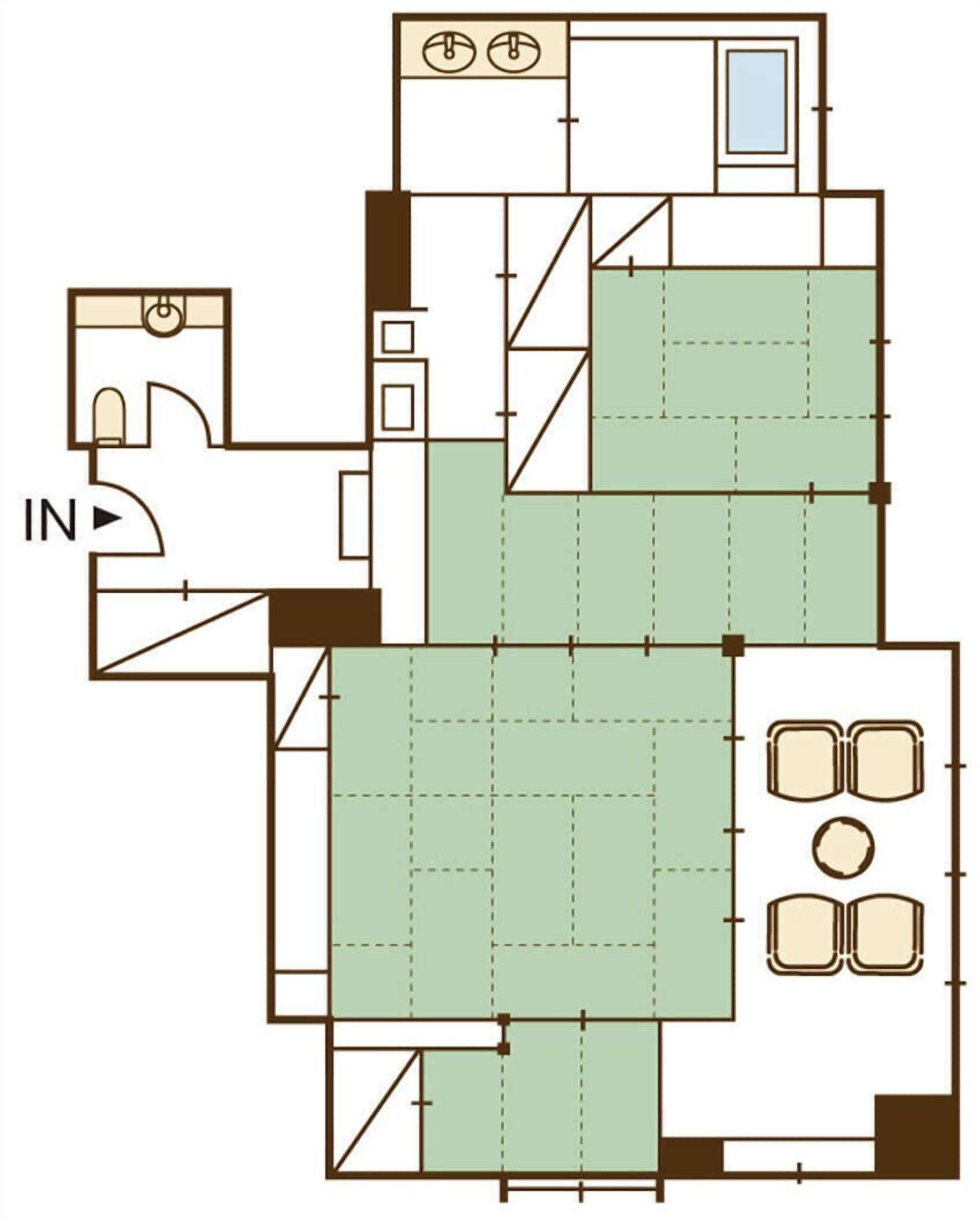A floor plan with a kitchen, dining area, and two bedrooms.