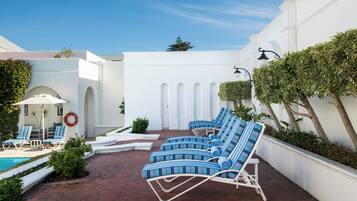 Outdoor pool, pool umbrellas, pool loungers