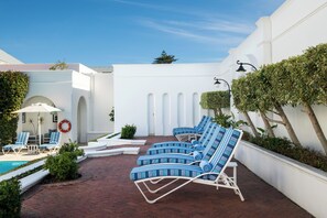 Outdoor pool, pool umbrellas, pool loungers