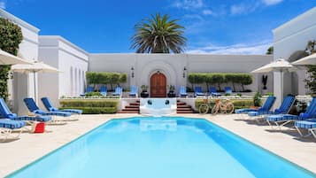 Outdoor pool, pool umbrellas, pool loungers