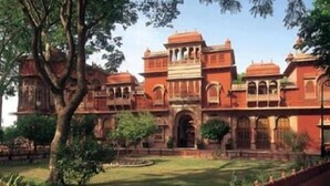 A large, historic building with multiple arches and a central courtyard. - Gajner Palace (Kolayat)