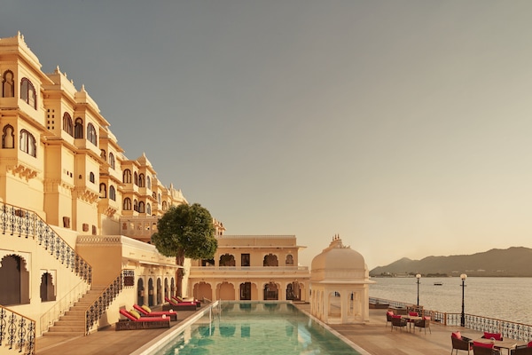 Outdoor pool, pool umbrellas, sun loungers
