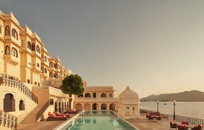 Outdoor pool, pool umbrellas, sun loungers