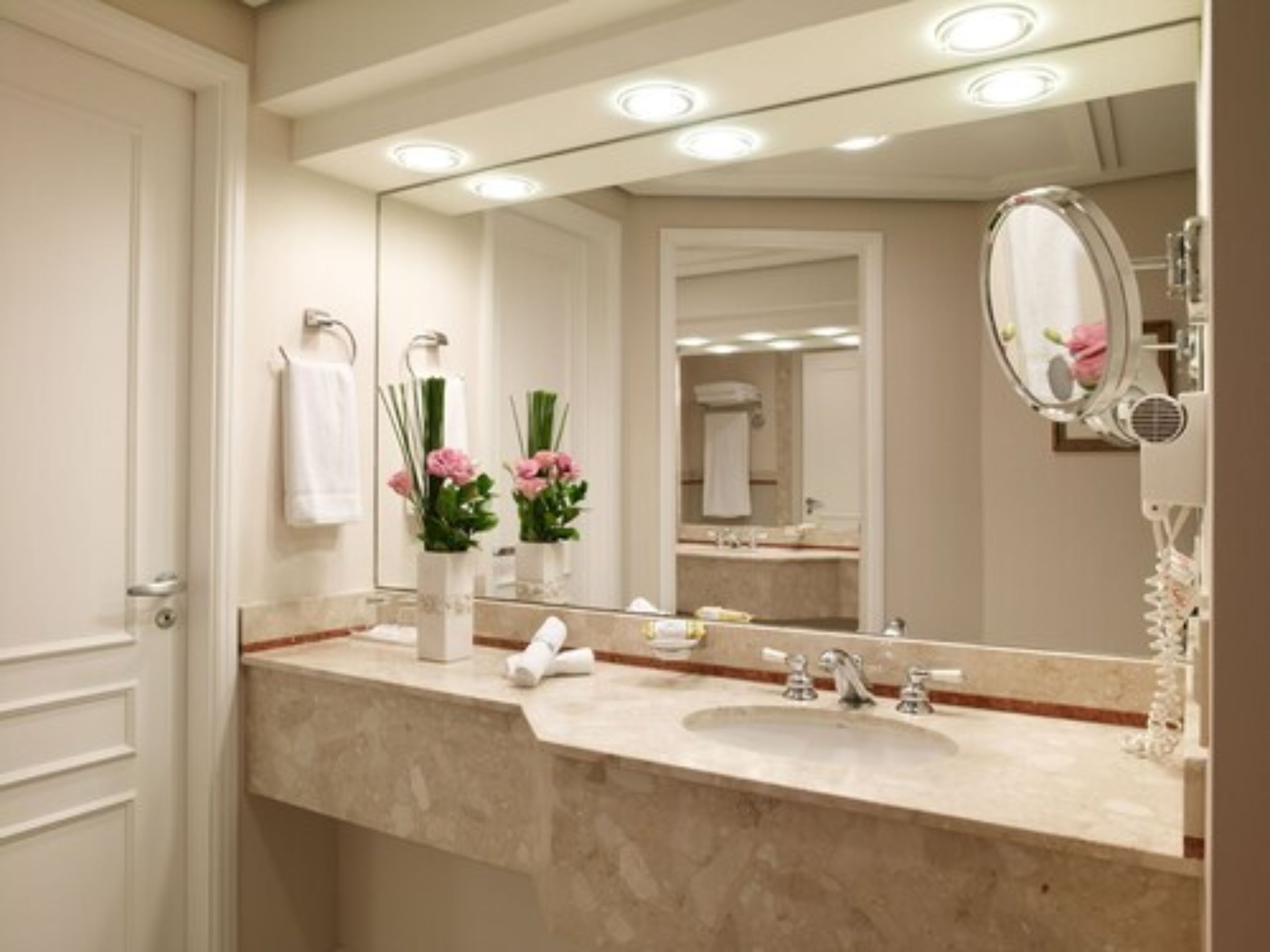 designer toiletries, hair dryer, bathrobes, slippers