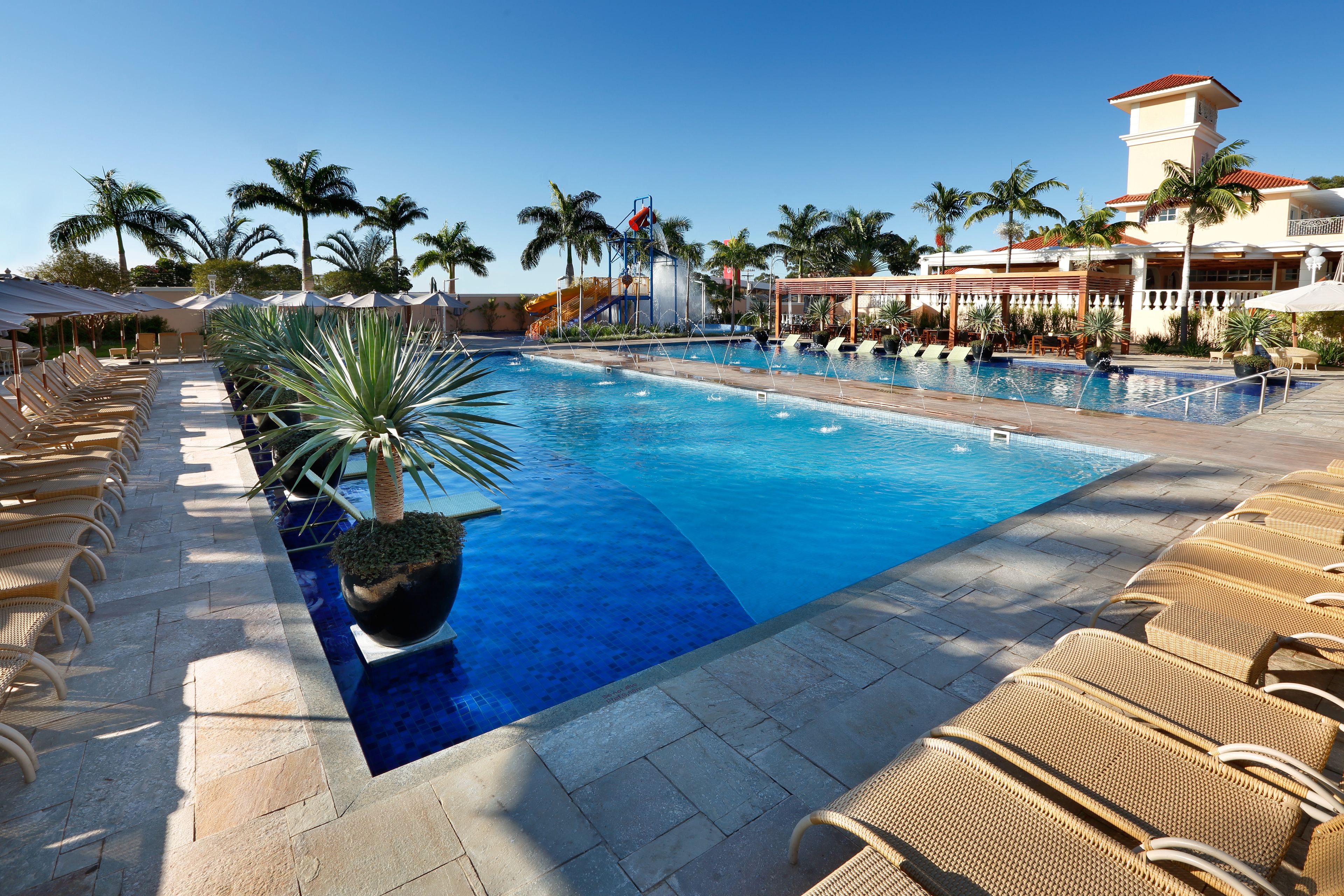 7 outdoor pools, pool umbrellas, pool loungers