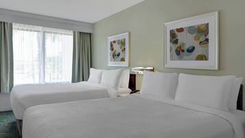 Premium bedding, pillow-top beds, desk, iron/ironing board