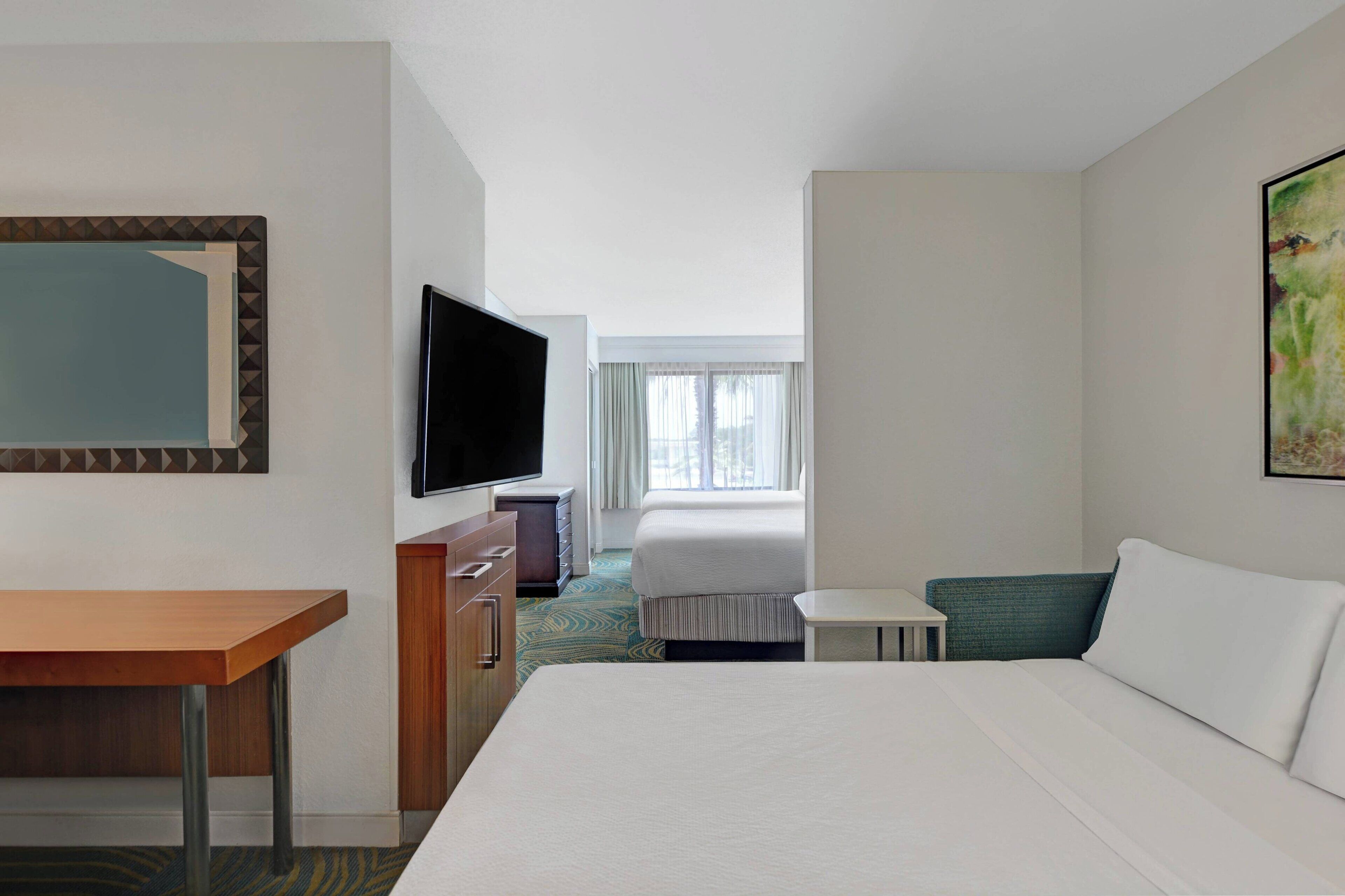 premium bedding, pillow-top beds, desk, iron/ironing board