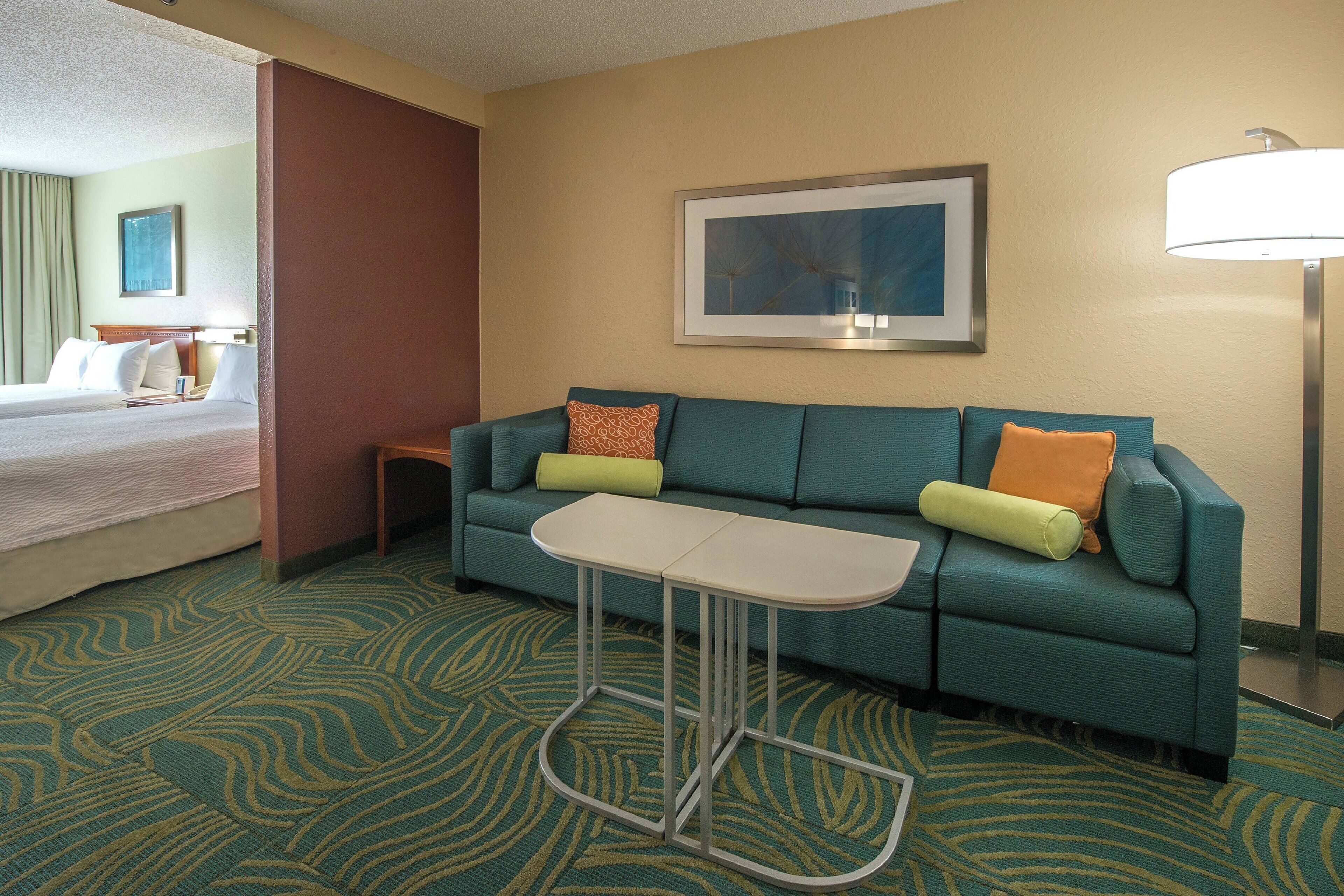 suite, multiple beds | living area | 32-inch flat-screen tv with cable channels, tv