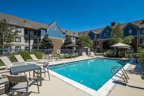 Seasonal outdoor pool, pool umbrellas, pool loungers