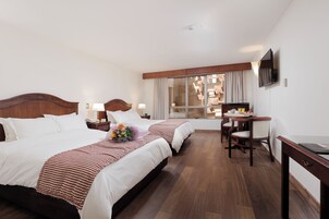 Ropa de cama de alta calidad y minibar 