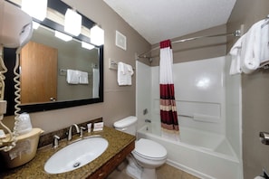 A bathroom with a sink, toilet, and bathtub. - Red Roof Inn Culpeper (Culpeper)