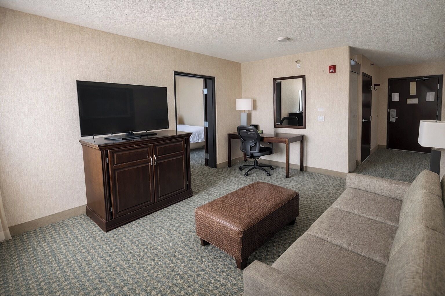 Suite, Multiple Beds, Accessible Bathtub (2 Rooms, Upper Floor) | Living area | 42-inch LCD TV with cable channels, TV