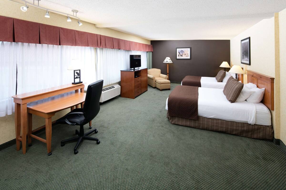 Premium bedding, pillowtop beds, desk, laptop workspace
