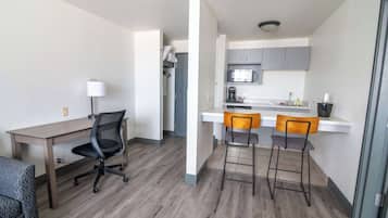 Family Suite, 1 King Bed, Non Smoking, Refrigerator & Microwave | 1 bedroom, desk, laptop workspace, blackout drapes