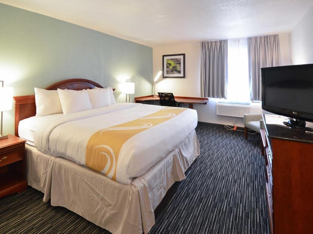 Premium bedding, pillowtop beds, desk, laptop workspace