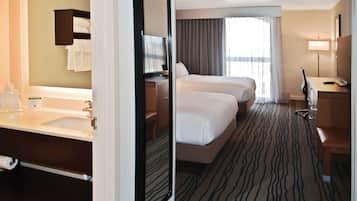 Premium bedding, down comforters, in-room safe, desk