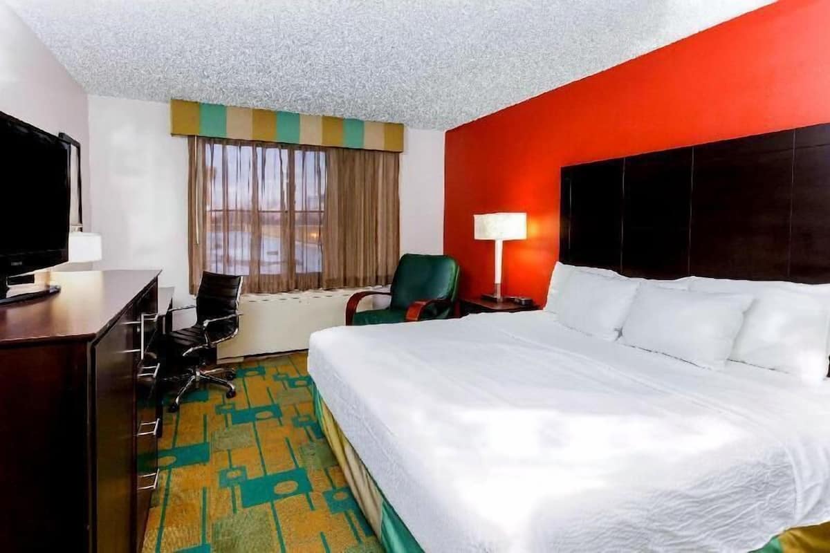 Premium bedding, pillowtop beds, desk, laptop workspace