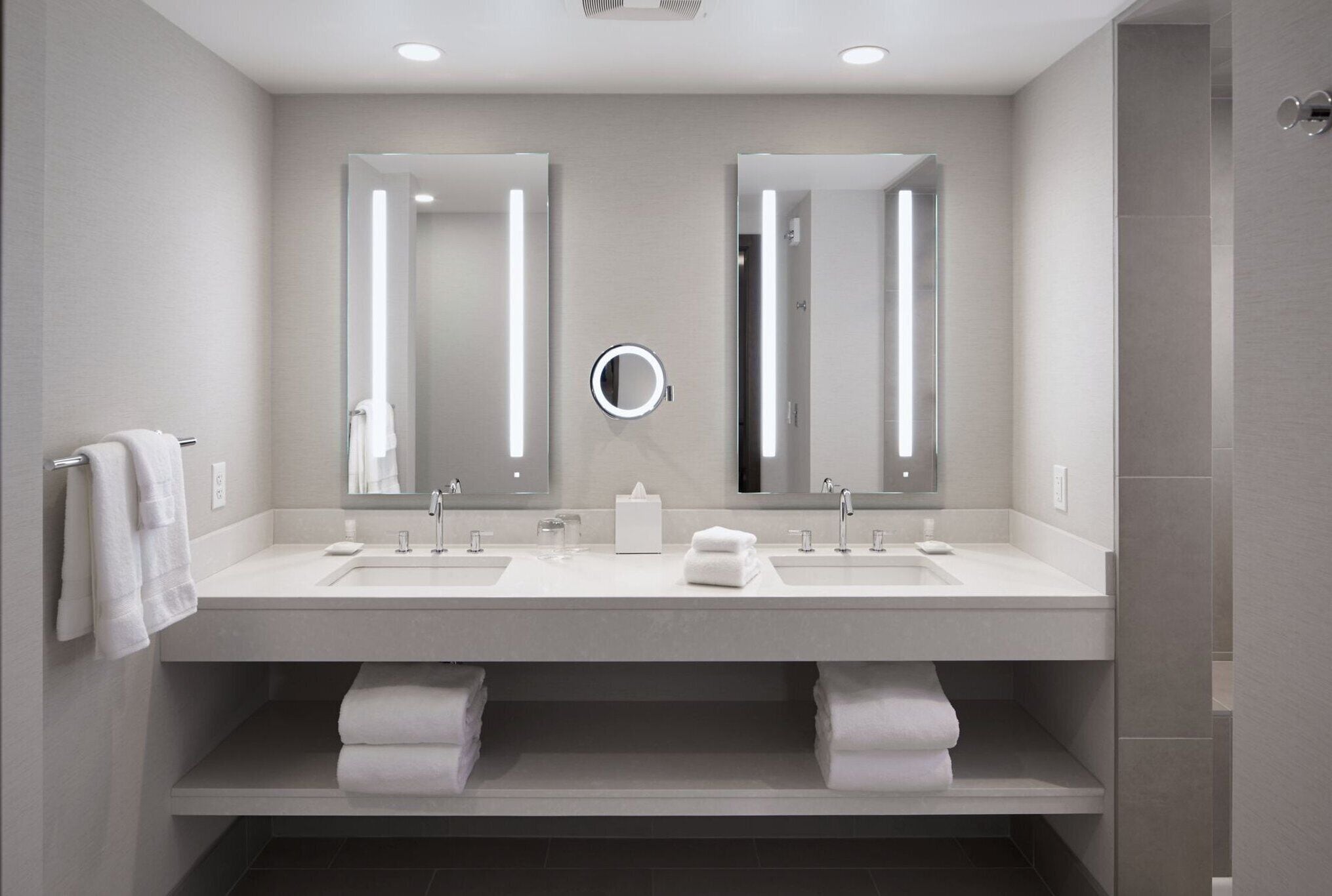 shower, designer toiletries, hair dryer, towels