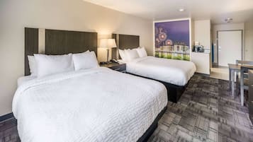 Pillow-top beds, desk, blackout curtains, iron/ironing board
