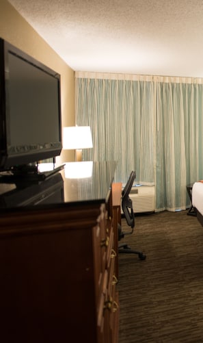 Desk, laptop workspace, blackout curtains, iron/ironing board