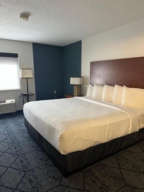 Deluxe Room, 1 King Bed, Non Smoking | Premium bedding, desk, iron/ironing board, free cribs/infant beds