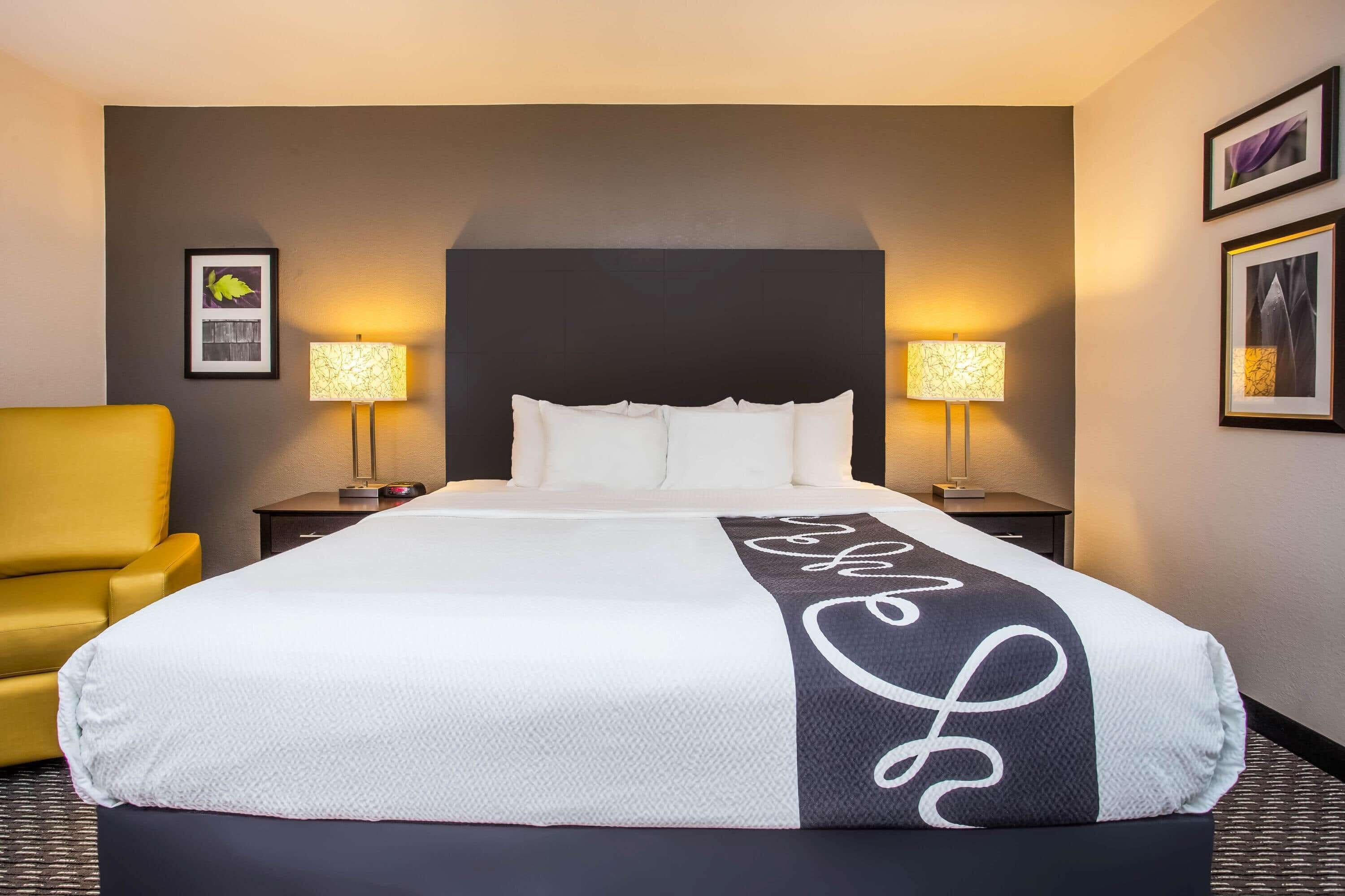 premium bedding, desk, blackout curtains, iron/ironing board