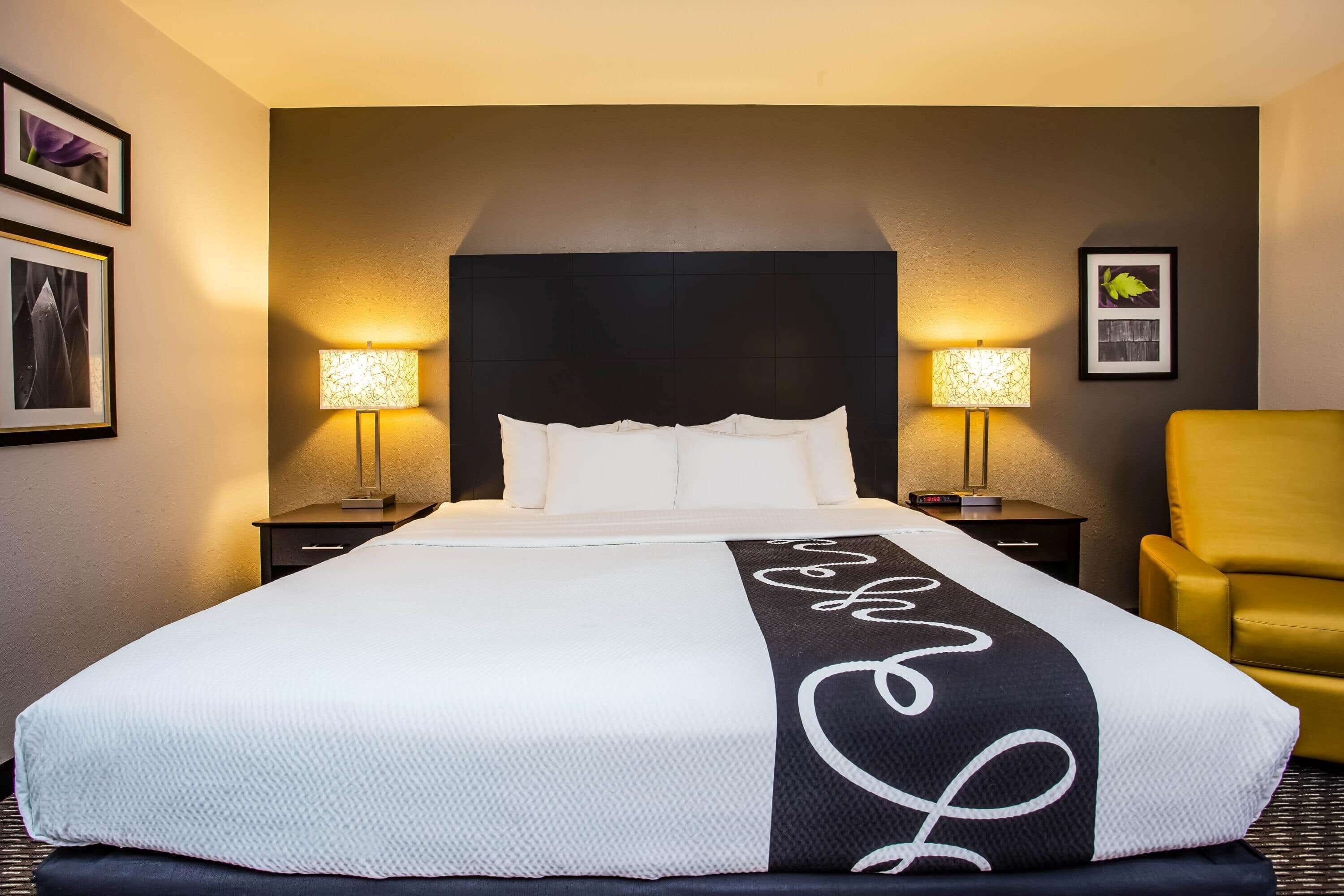 premium bedding, desk, blackout curtains, iron/ironing board