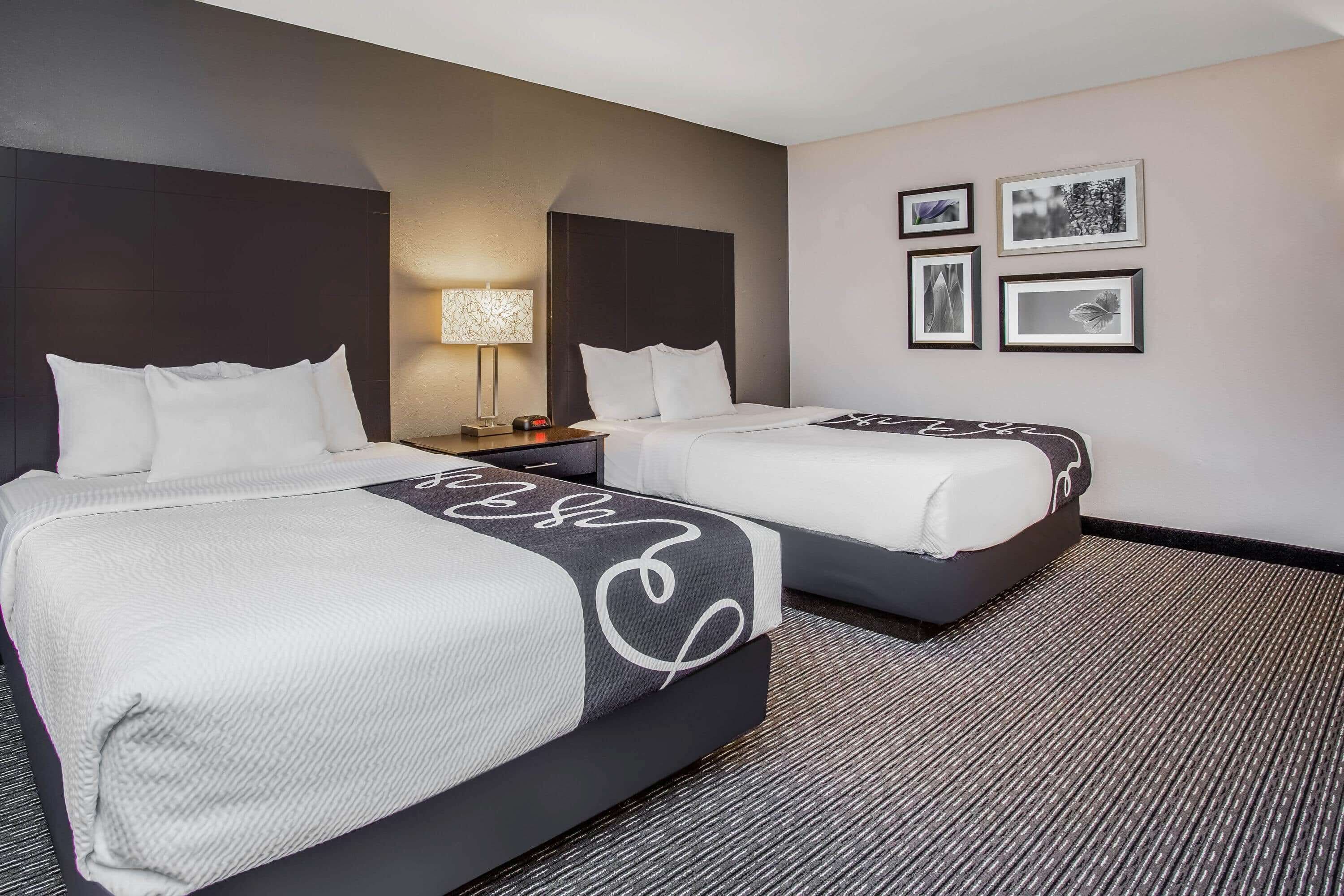 premium bedding, desk, blackout curtains, iron/ironing board