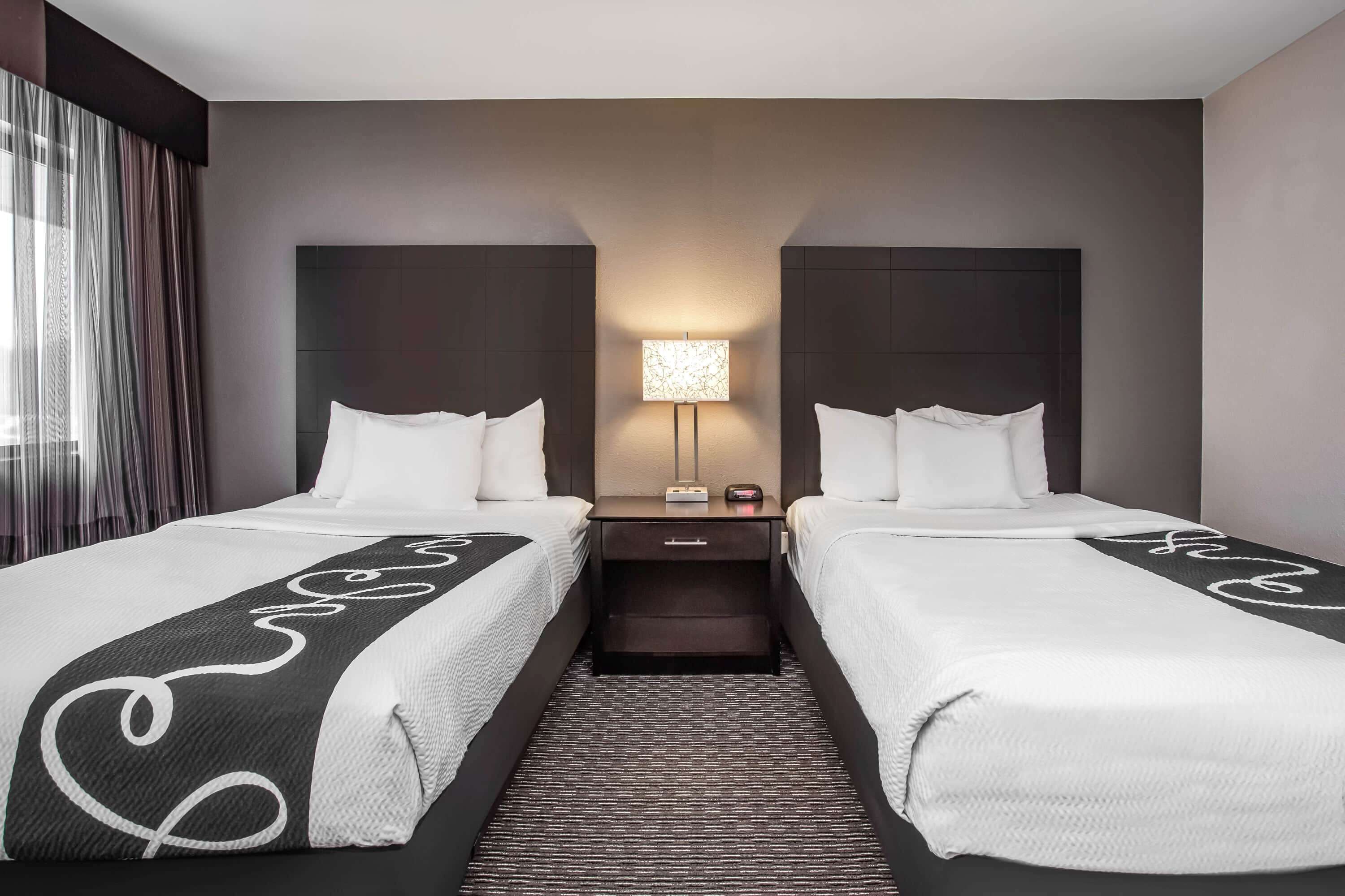 premium bedding, desk, blackout curtains, iron/ironing board