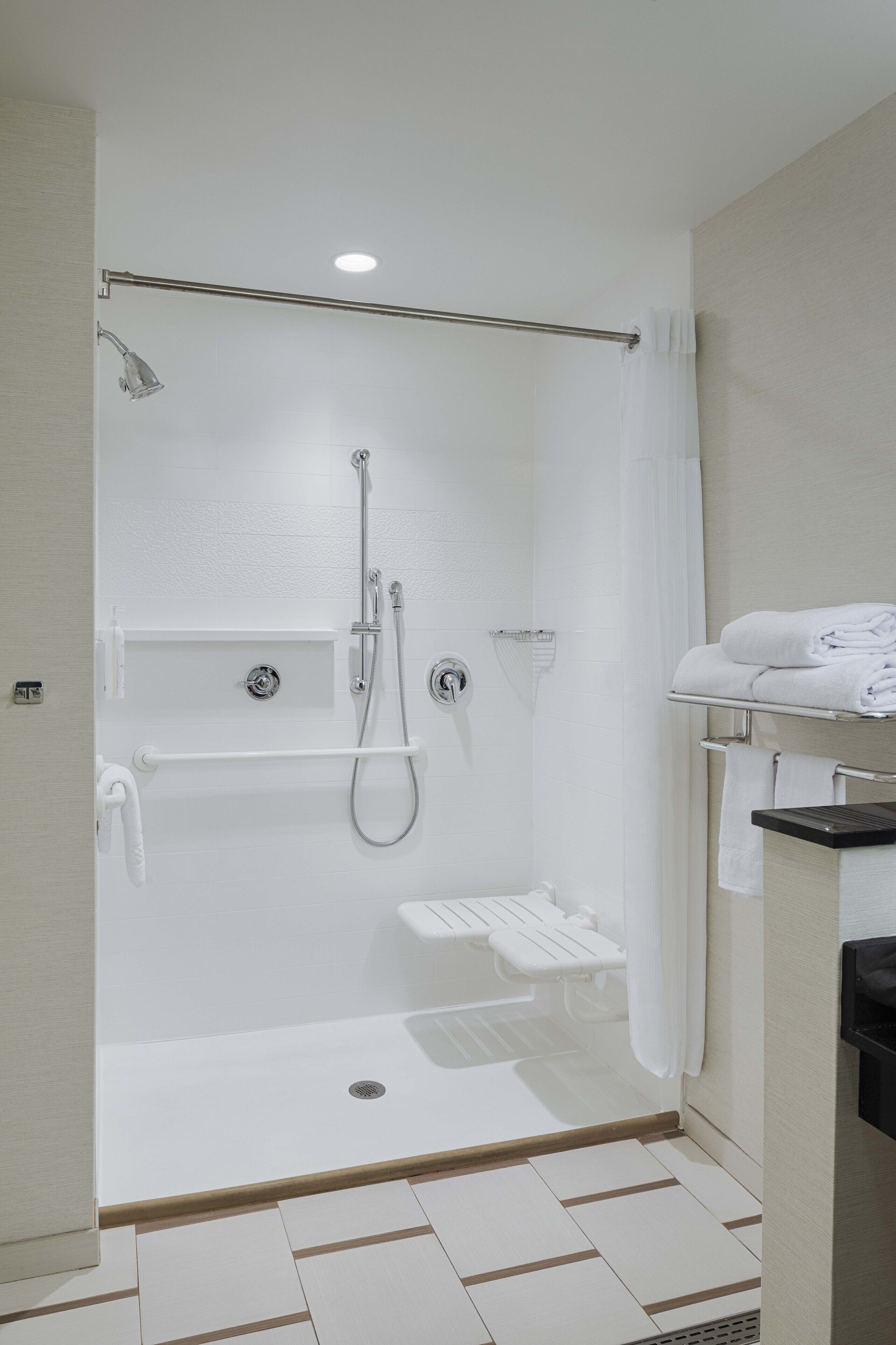 hydromassage showerhead, free toiletries, hair dryer, towels