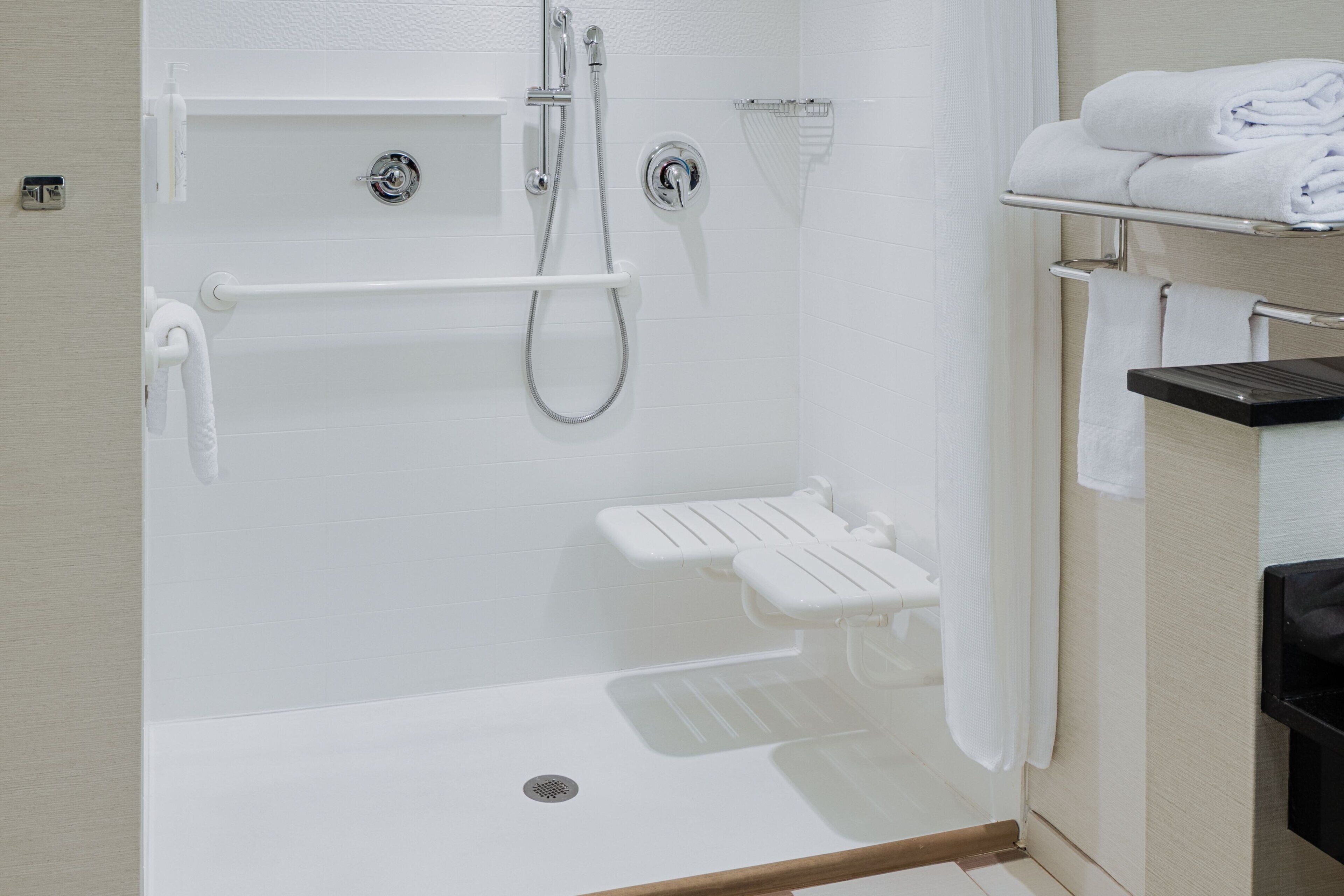 hydromassage showerhead, free toiletries, hair dryer, towels