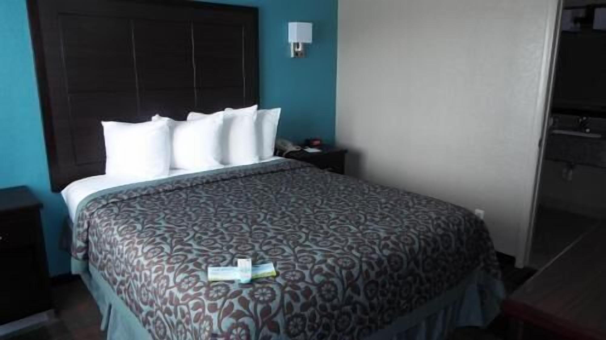 Premium bedding, desk, blackout drapes, iron/ironing board