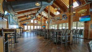 A spacious restaurant with high ceilings, wooden floors, and multiple dining areas. - Resorts Casino Hotel Atlantic City (Atlantic City)