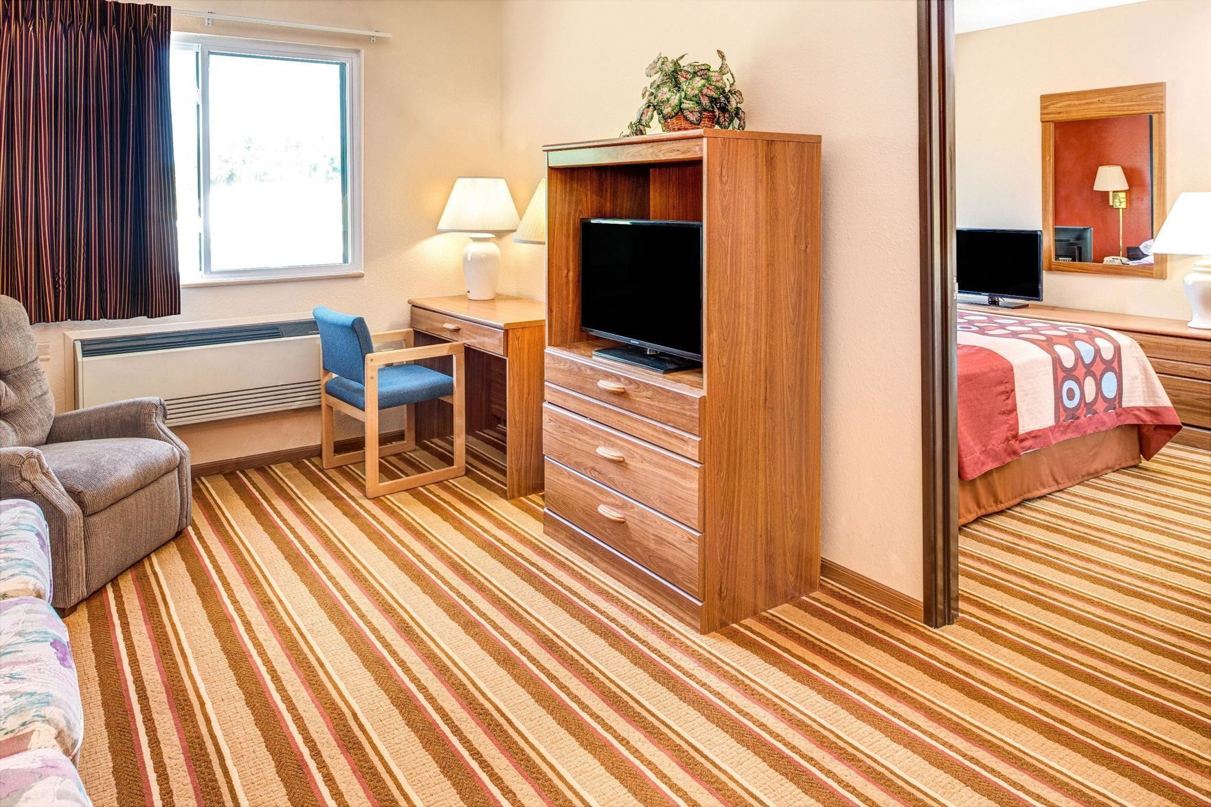 Blackout drapes, iron/ironing board, rollaway beds, free WiFi