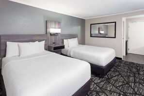 Deluxe Room, 2 Double Beds | Premium bedding, desk, iron/ironing board, free cribs/infant beds
