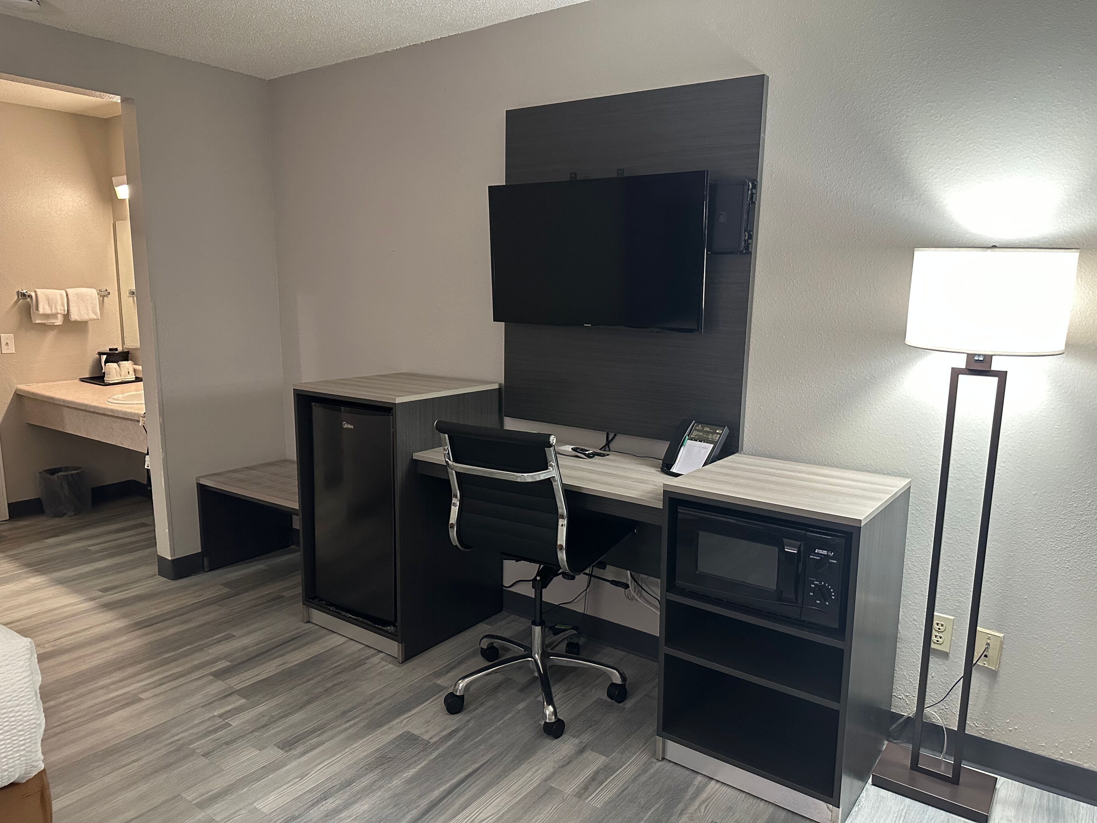 Desk, blackout drapes, iron/ironing board, free cribs/infant beds
