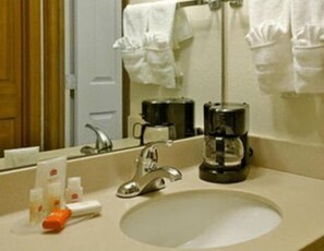 Separate bathtub and shower, hair dryer, towels